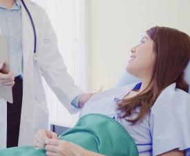 Female patient with doctor