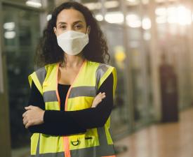 Female worker vest and face mask